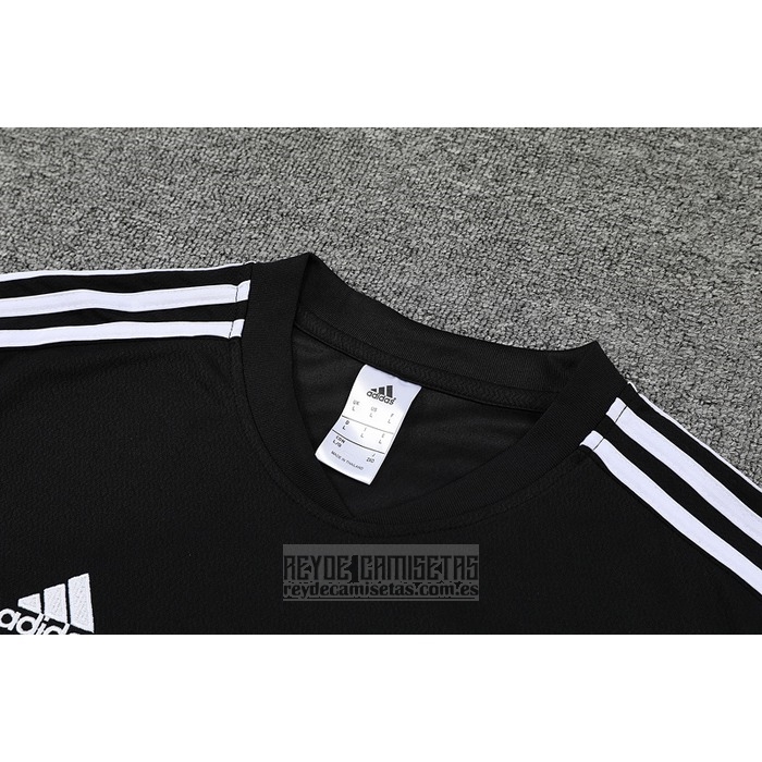 Chandal del Real Madrid Manga Corta 2022-2023 Negro y Purpura - Pantalon Corto